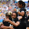 New Zealand players celebrate their extra-time win in the gold medal match of the rugby sevens. 